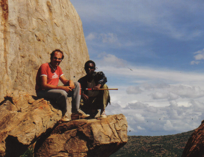 Jeffrey Hatcher at Lentille Kenya 1990 with John Nayioma on safari with Michael Rainey